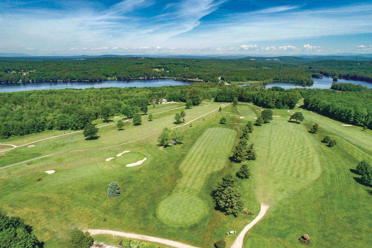 Poland Spring Resort aerial view with lake and rolling hills
